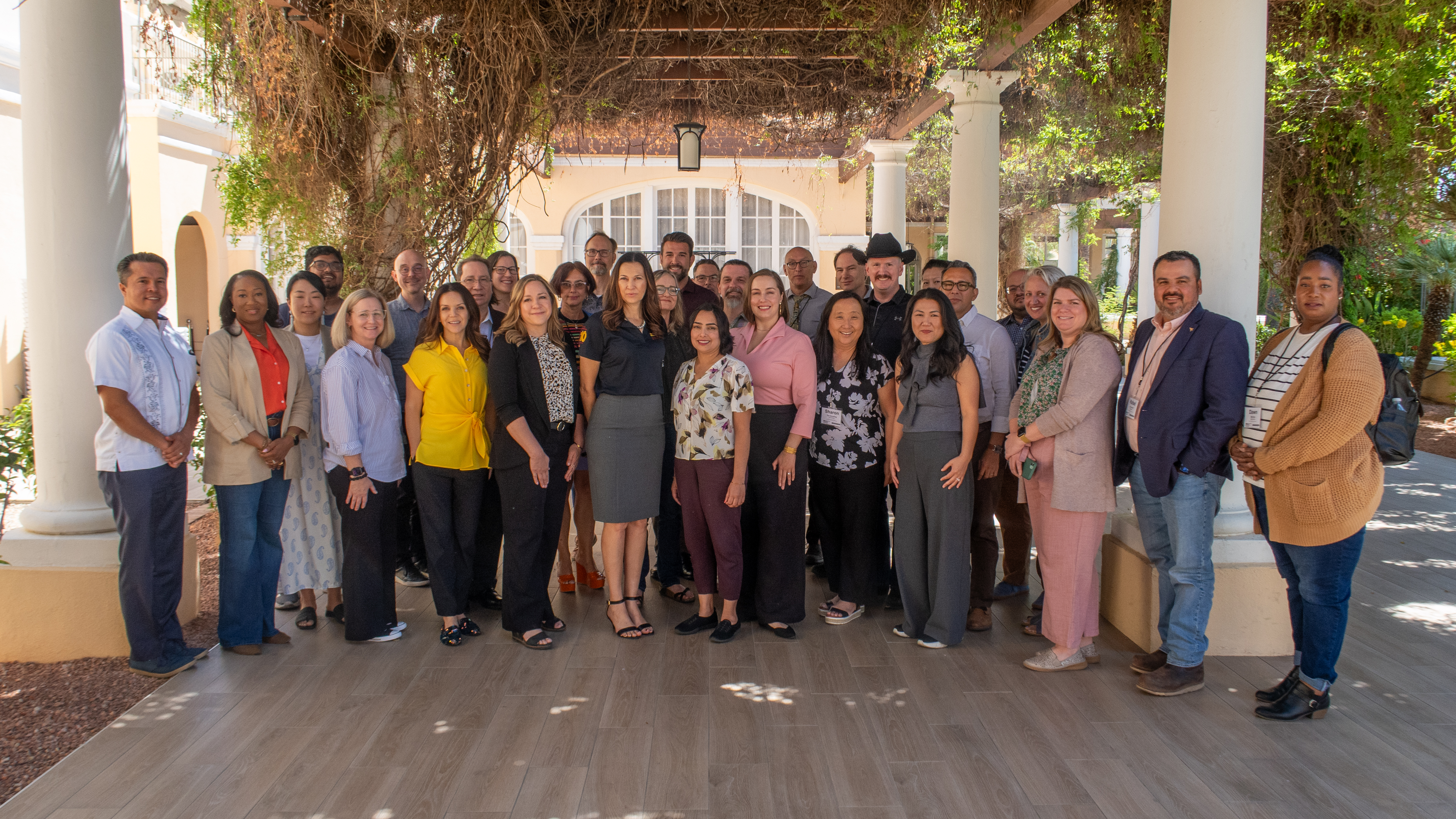 34 faculty and staff gather outside for ASU Leadership Academy graduation