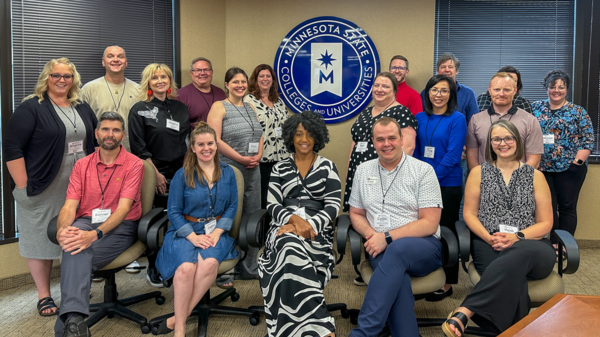 Leaders from Bemidji State University, Metro State University, Minnesota State University-Moorhead, and the Minnesota State System gather for a photo at the end of the session.